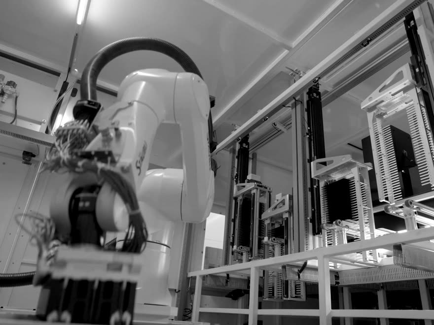 An industrial robot arm on a factory line